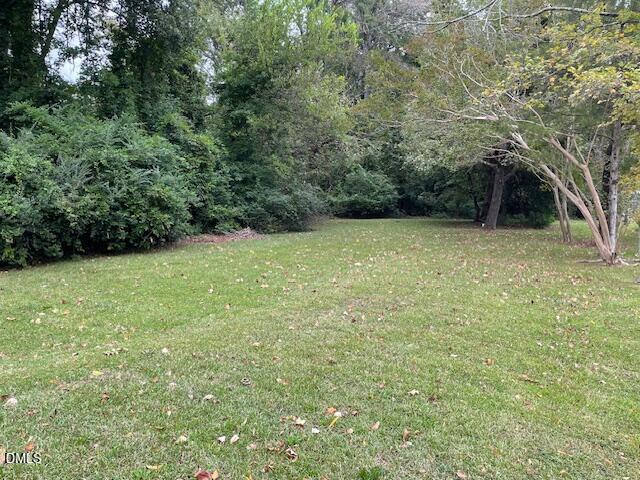 206 Hillsborough Road Carrboro, NC 27510 - Photo 2 of 5 a view of a yard with a trees