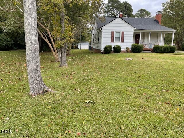 206 Hillsborough Road Carrboro, NC 27510 - Photo 5 of 5 a front view of a house with a yard