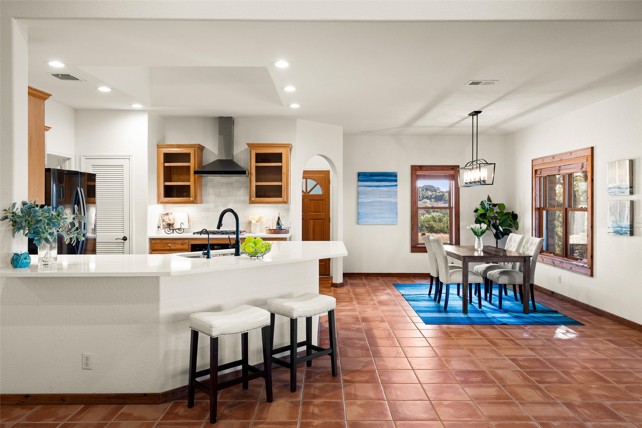 300 Sundown Ridge Austin, TX 78737 - Photo 14 of 40 a view of a dining room with furniture window and wooden floor