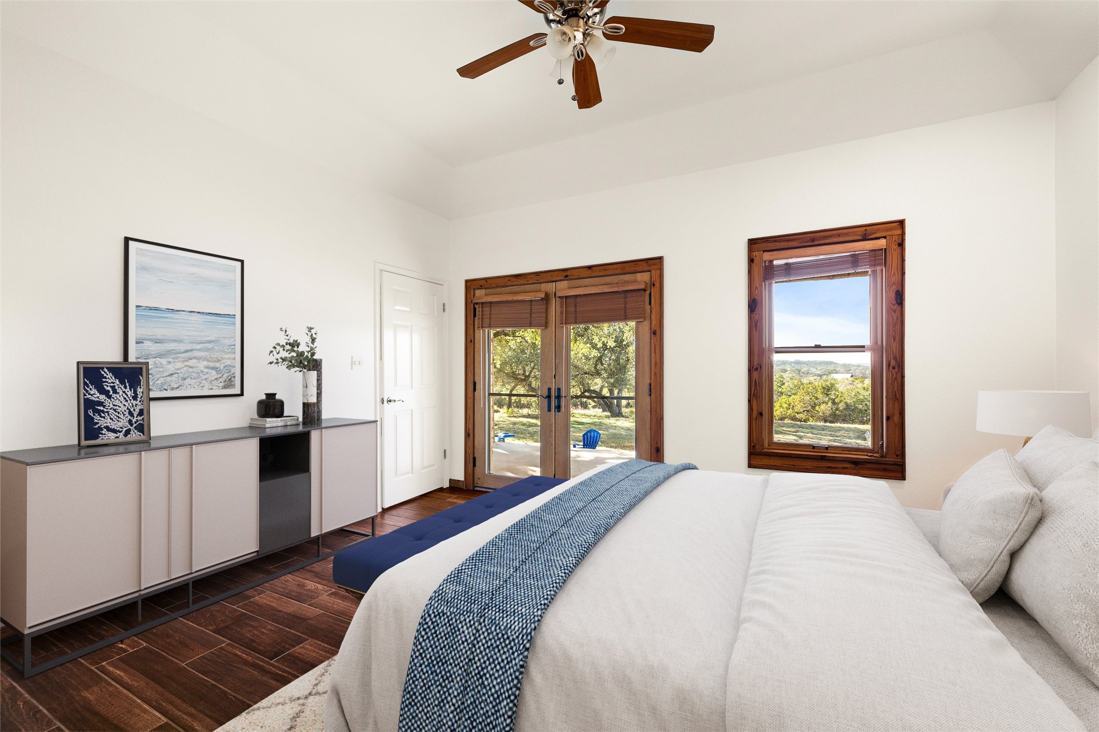 300 Sundown Ridge Austin, TX 78737 - Photo 20 of 40 a bedroom with a bed and a large window