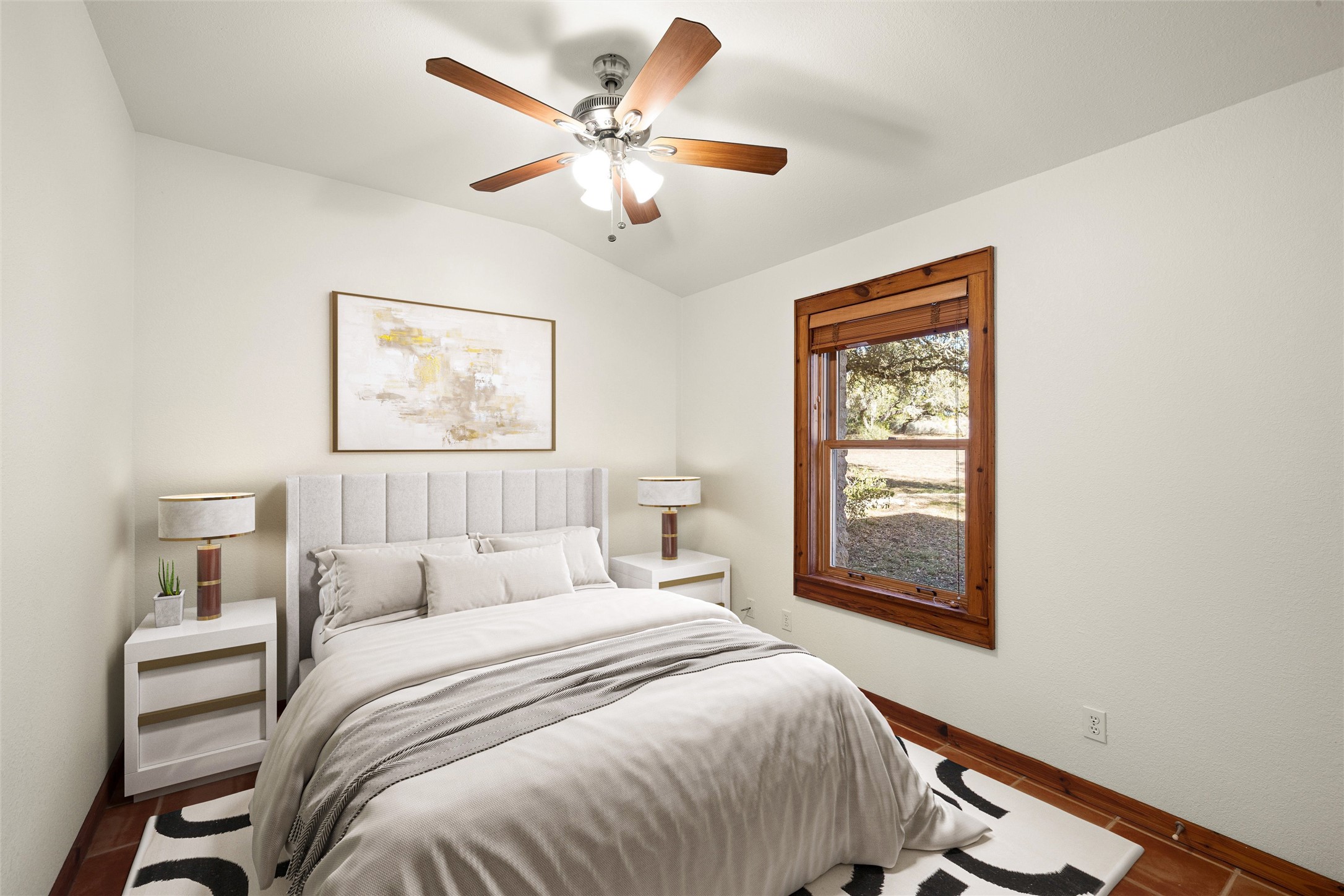 300 Sundown Ridge Austin, TX 78737 - Photo 25 of 40 a bedroom with a large bed and a window