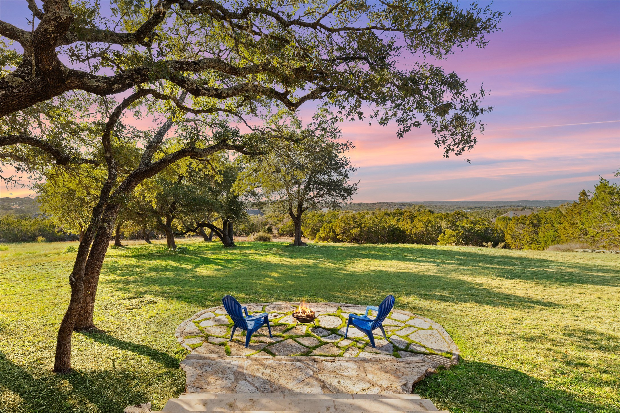 300 Sundown Ridge Austin, TX 78737 - Photo 32 of 40 a view of a golf course with a lake view
