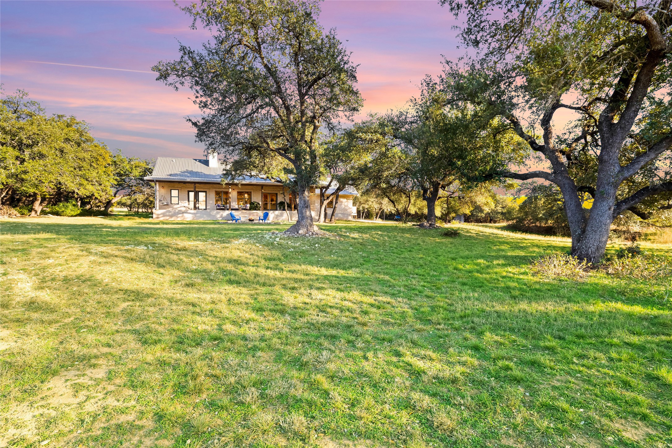 300 Sundown Ridge Austin, TX 78737 - Photo 36 of 40 a view of a large trees with a big yard and large trees