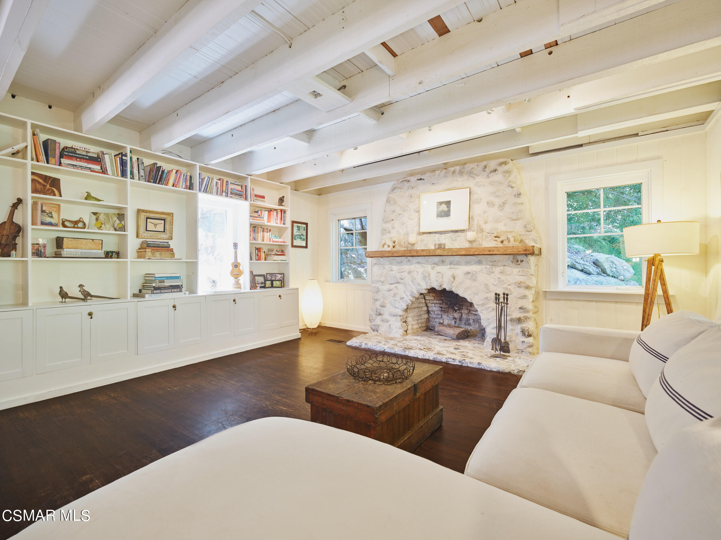 19833 Observation Drive Topanga, CA 90290 - Photo 13 of 75 a living room with furniture and a fireplace