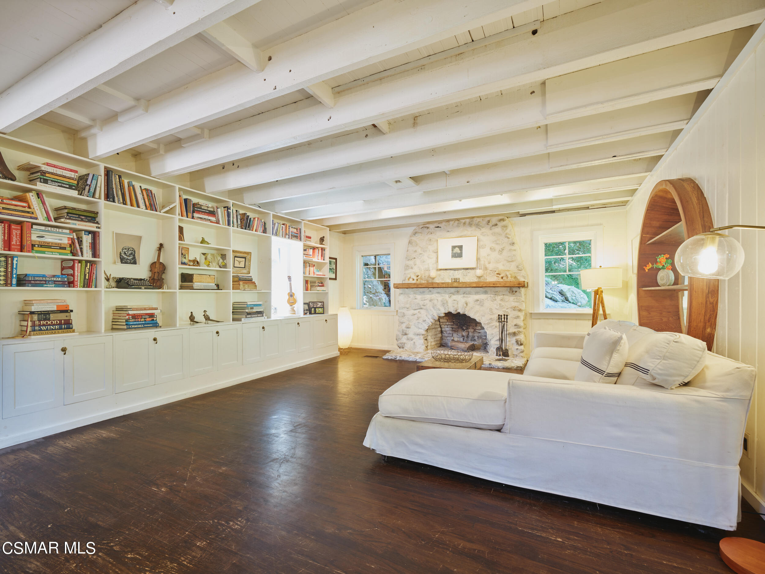 19833 Observation Drive Topanga, CA 90290 - Photo 14 of 75 a living room with furniture and a wooden floor