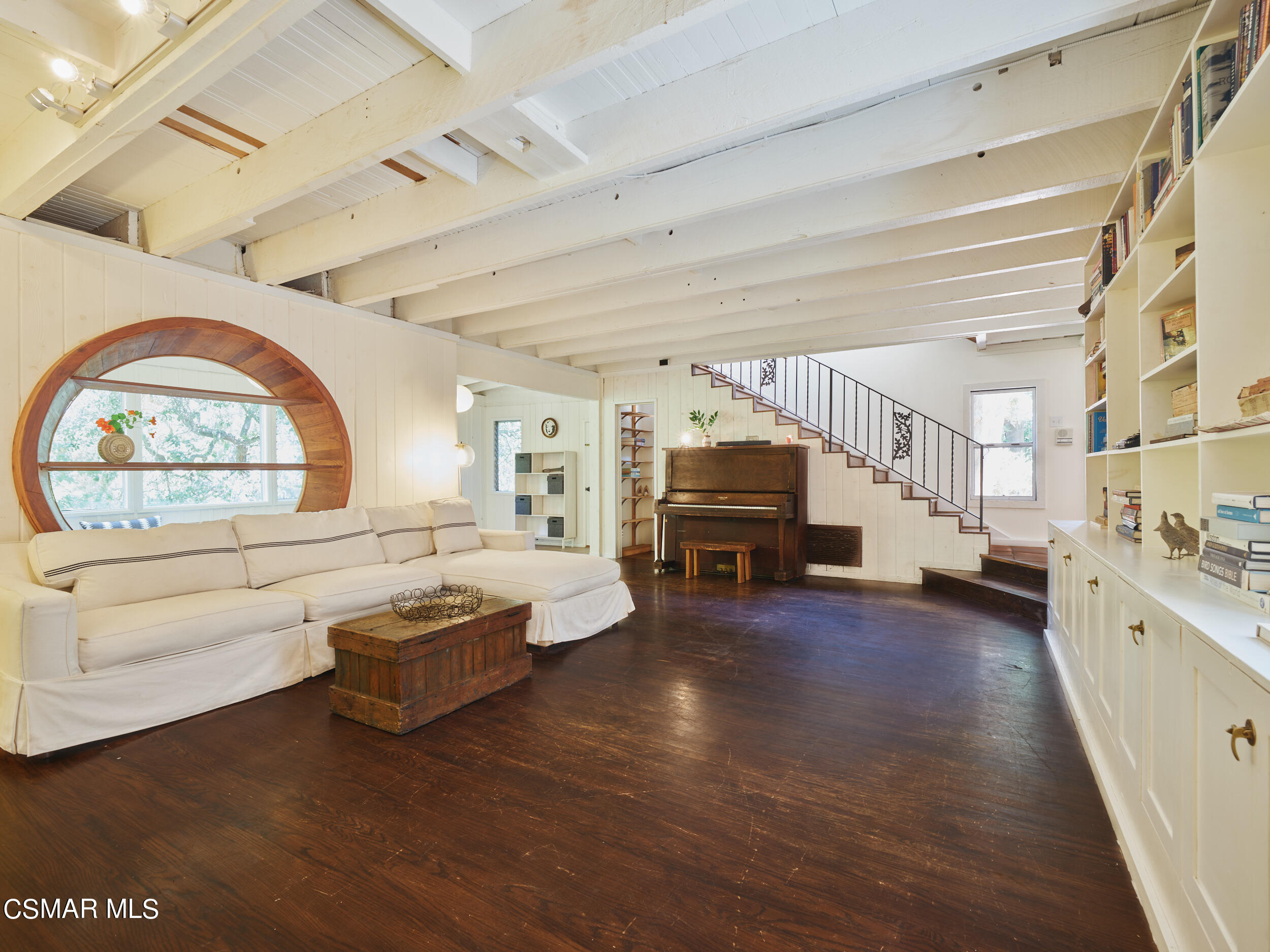 19833 Observation Drive Topanga, CA 90290 - Photo 15 of 75 a living room with furniture and a large window