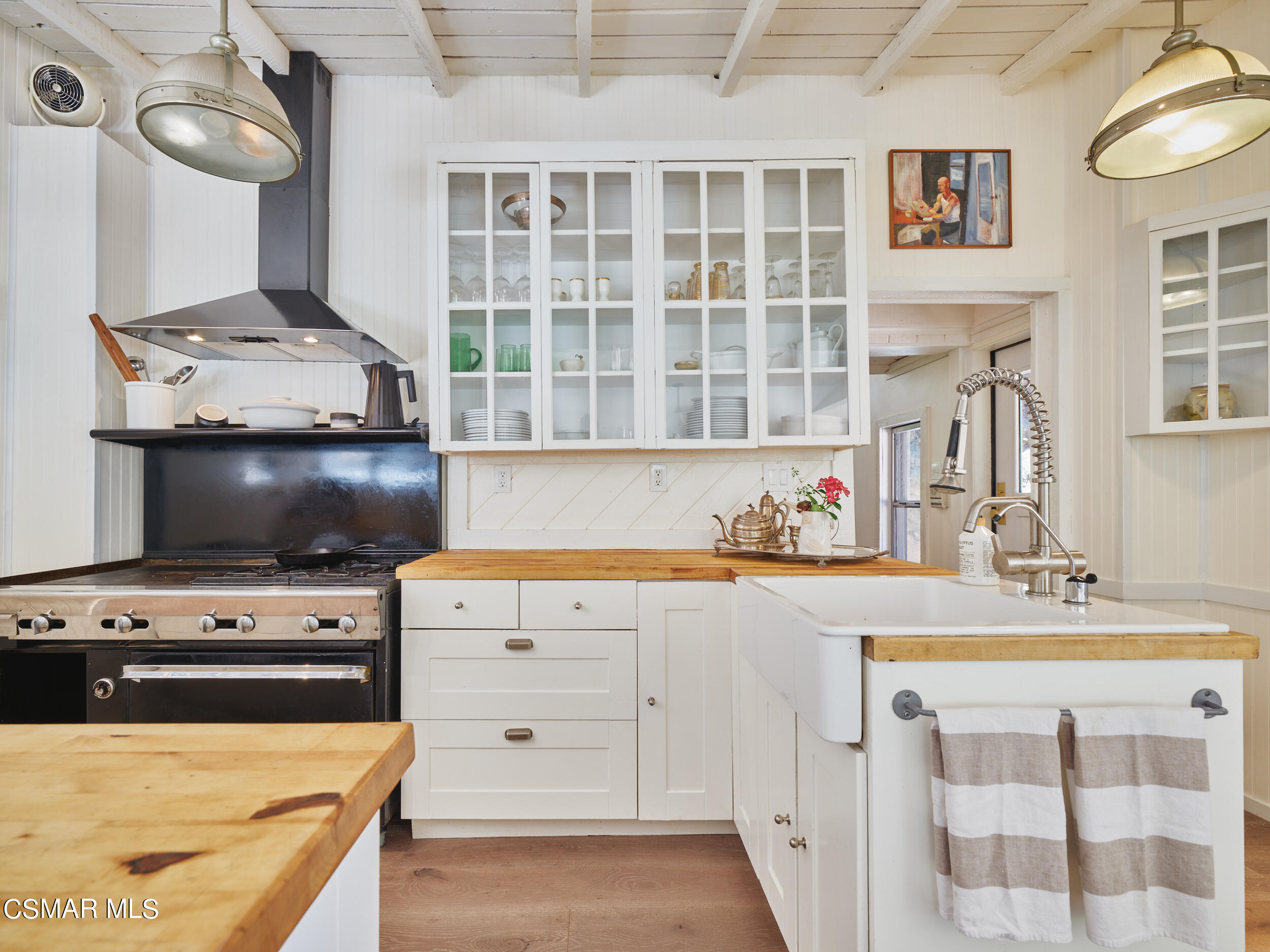 19833 Observation Drive Topanga, CA 90290 - Photo 20 of 75 a kitchen with a stove and a sink