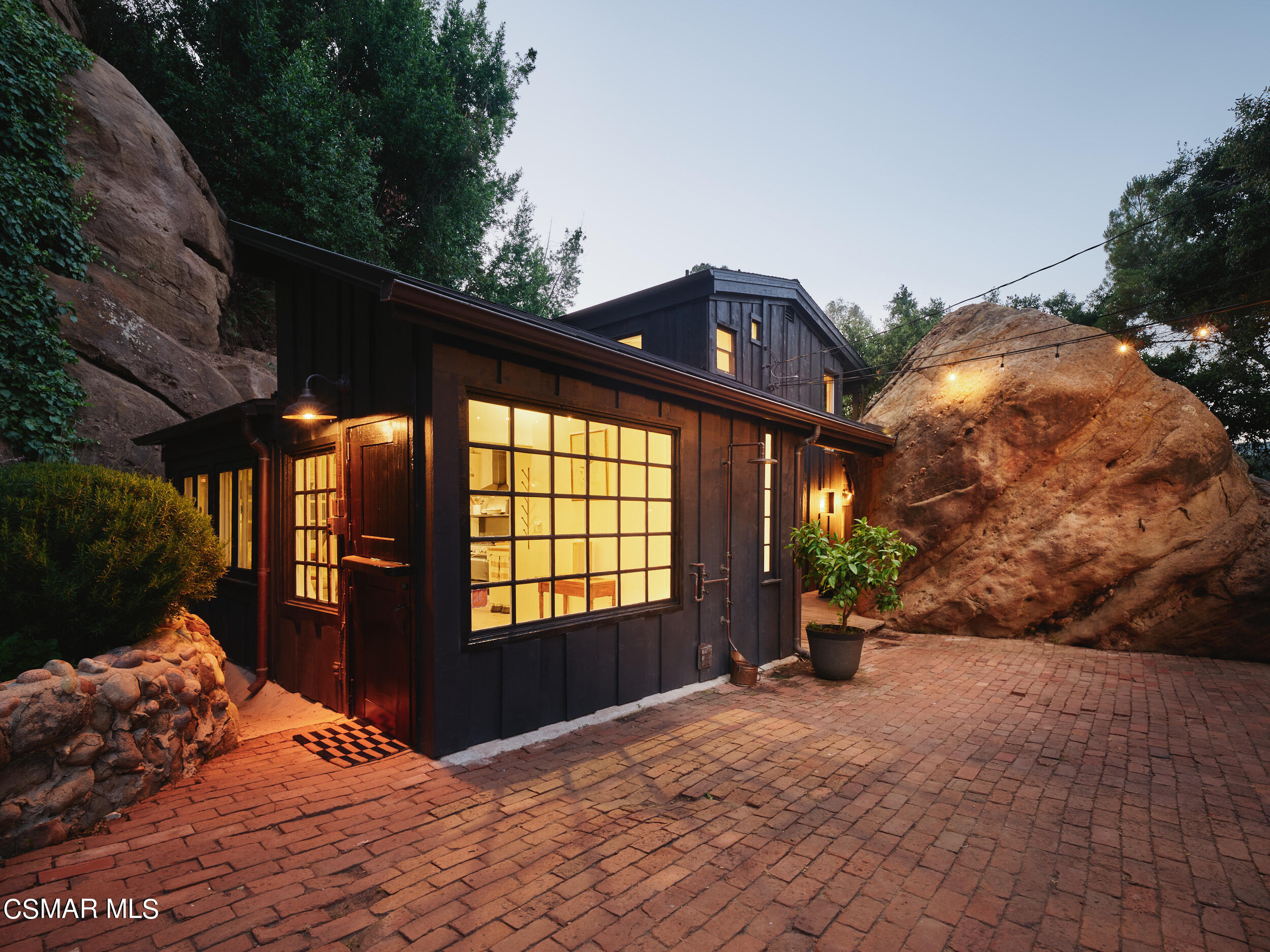 19833 Observation Drive Topanga, CA 90290 - Photo 2 of 75 a front view of a house with a yard
