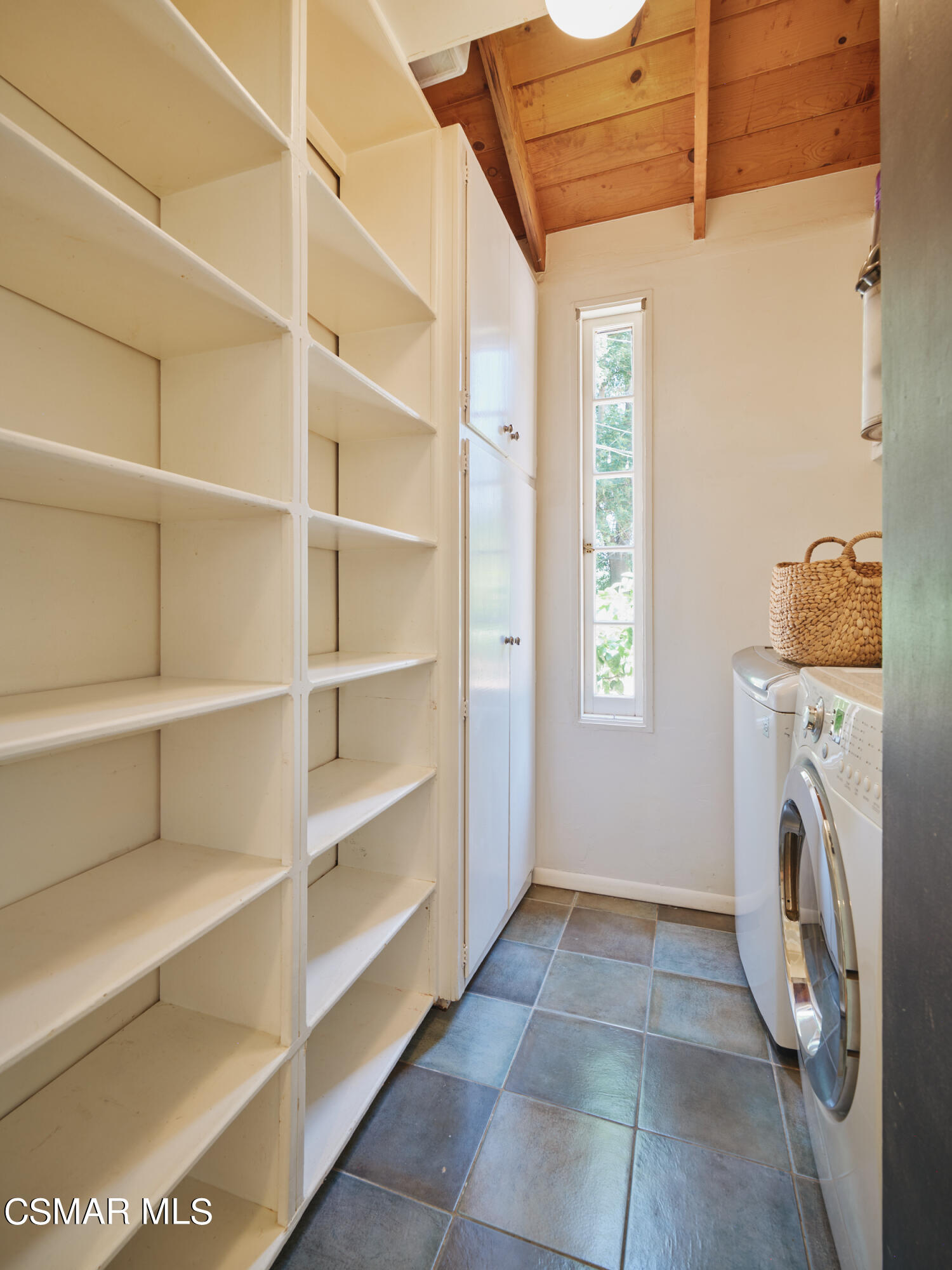 19833 Observation Drive Topanga, CA 90290 - Photo 23 of 75 a view of a storage & utility room with washer and dryer