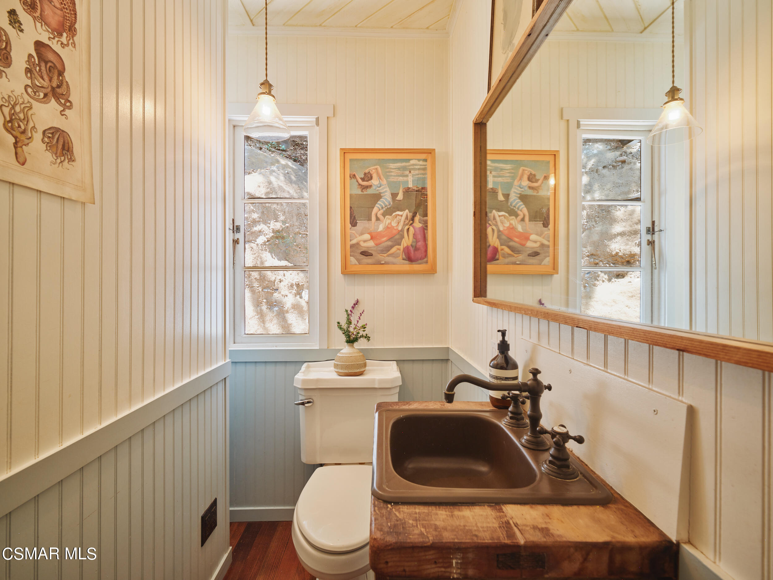 19833 Observation Drive Topanga, CA 90290 - Photo 30 of 75 a bathroom with a sink a toilet and tub