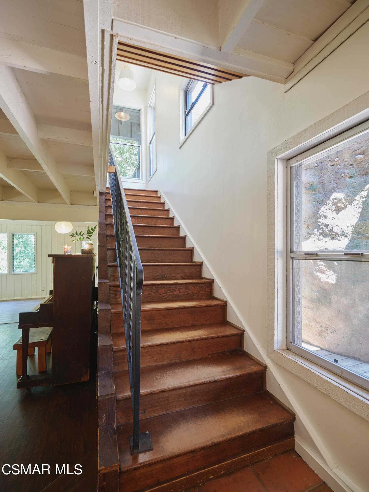 19833 Observation Drive Topanga, CA 90290 - Photo 31 of 75 a view of staircase with wooden floor and furniture