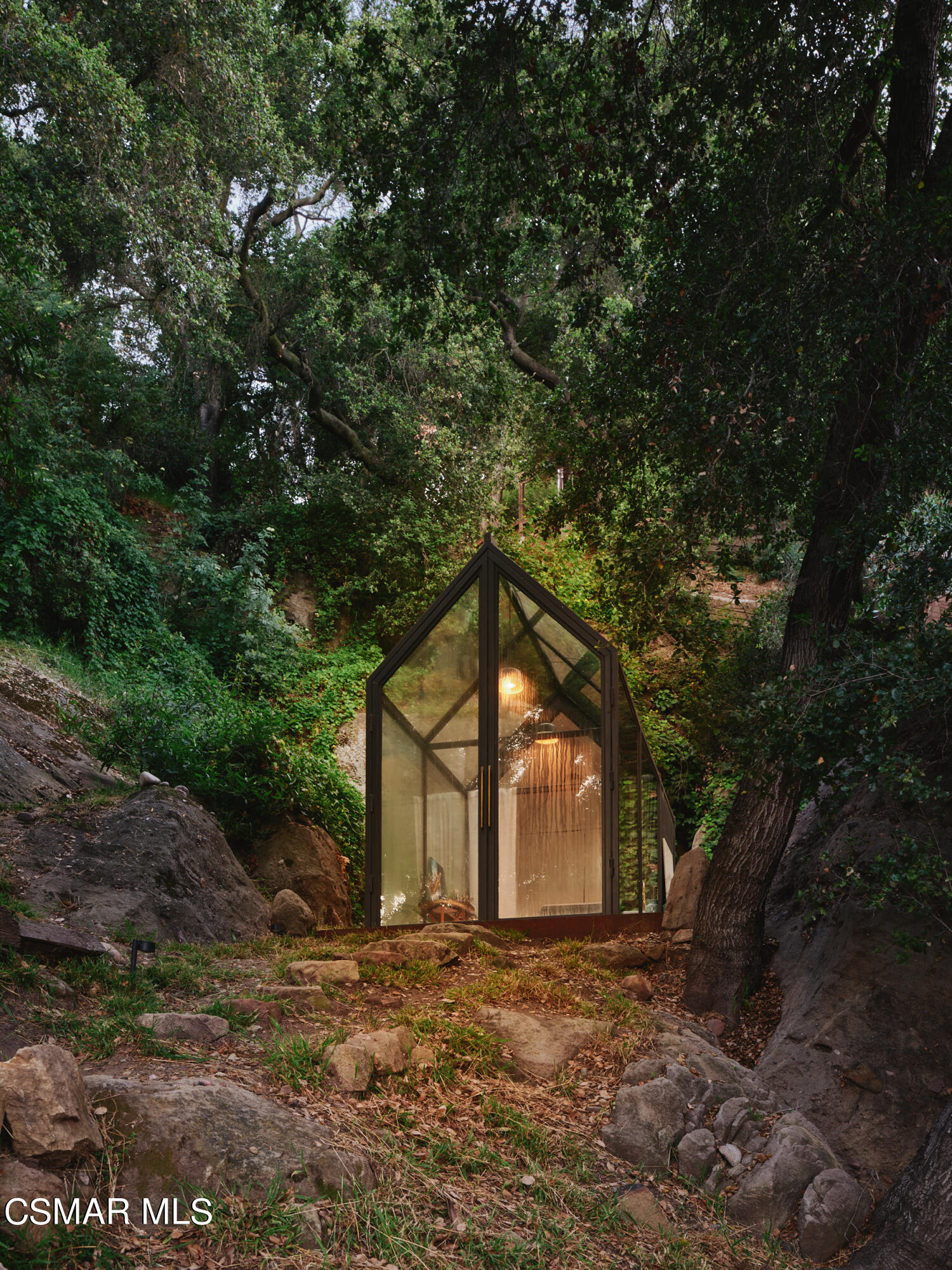 19833 Observation Drive Topanga, CA 90290 - Photo 7 of 75 a large tree in front of a house