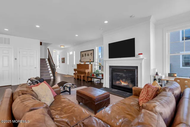 a living room with furniture or fireplace and a flat screen tv