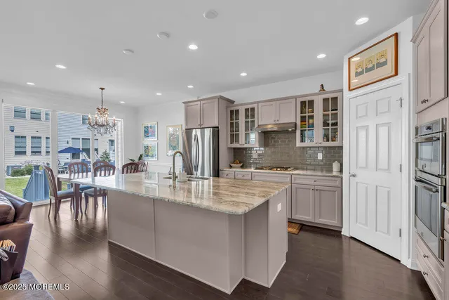 a view of living room filled with furniture and window