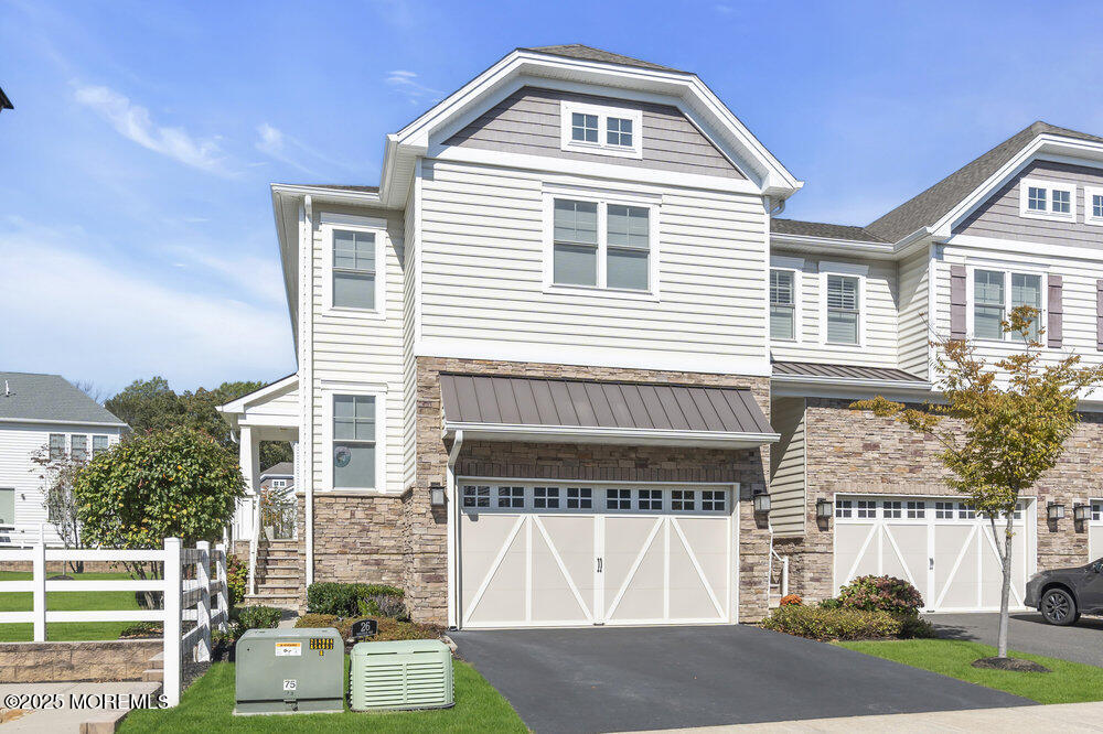 26 Malcolm Way Lincroft, NJ 07738 - Photo 2 of 44 a front view of a house with a yard