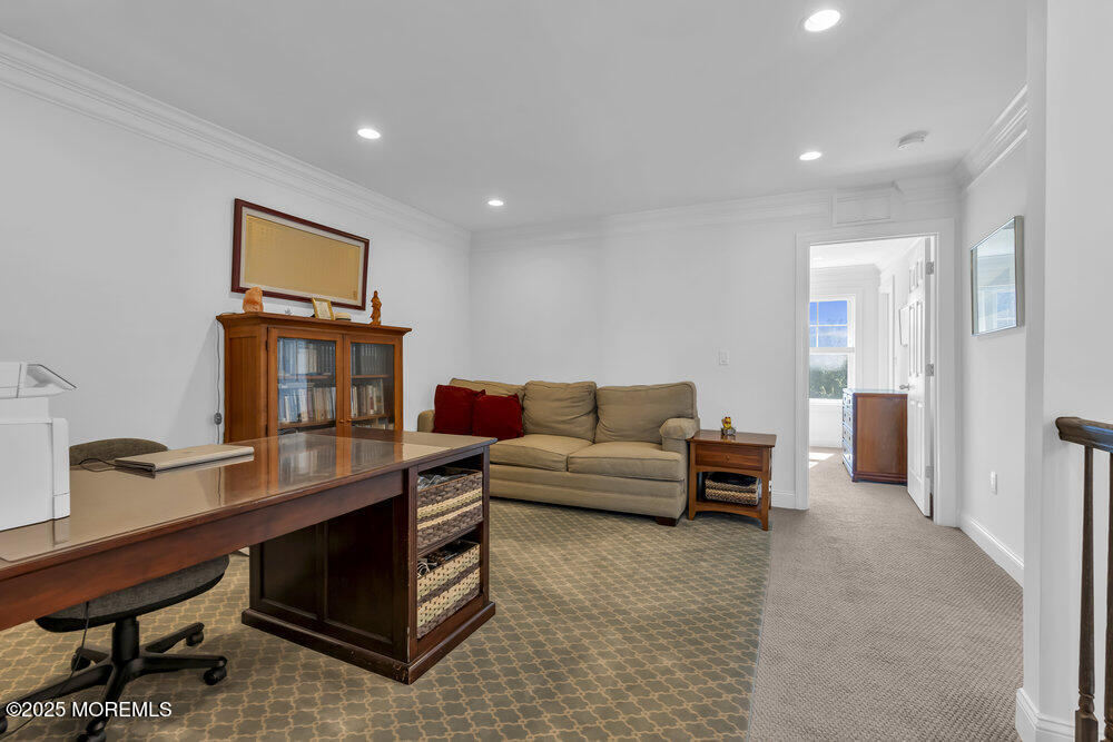 26 Malcolm Way Lincroft, NJ 07738 - Photo 24 of 44 a living room with furniture and a window