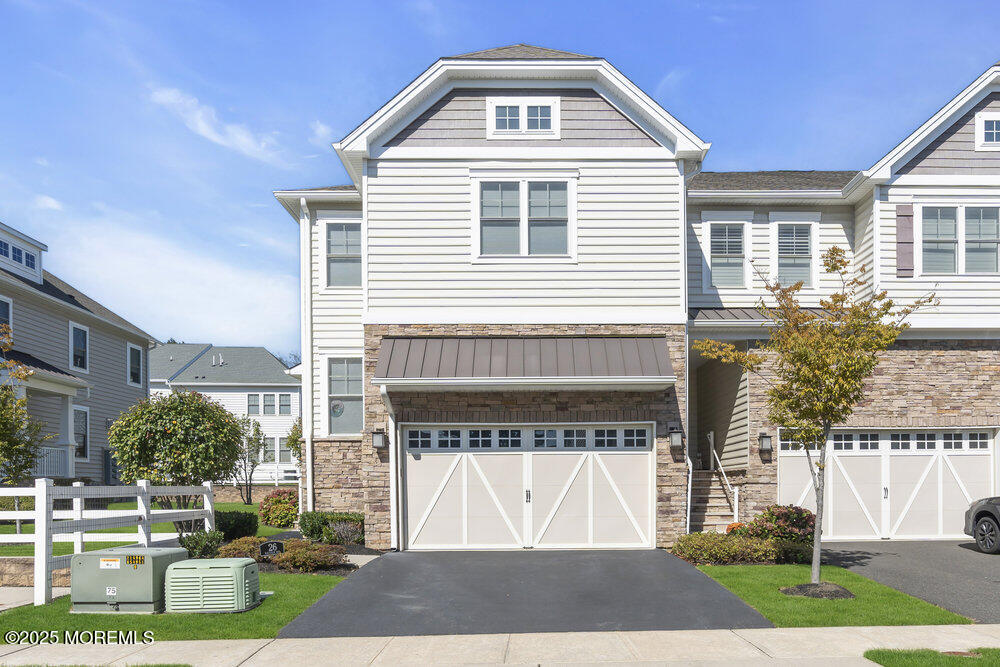 26 Malcolm Way Lincroft, NJ 07738 - Photo 3 of 44 a front view of a house with a yard