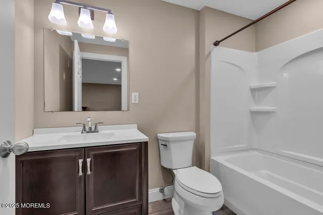 a view of a patio with chairs and plants