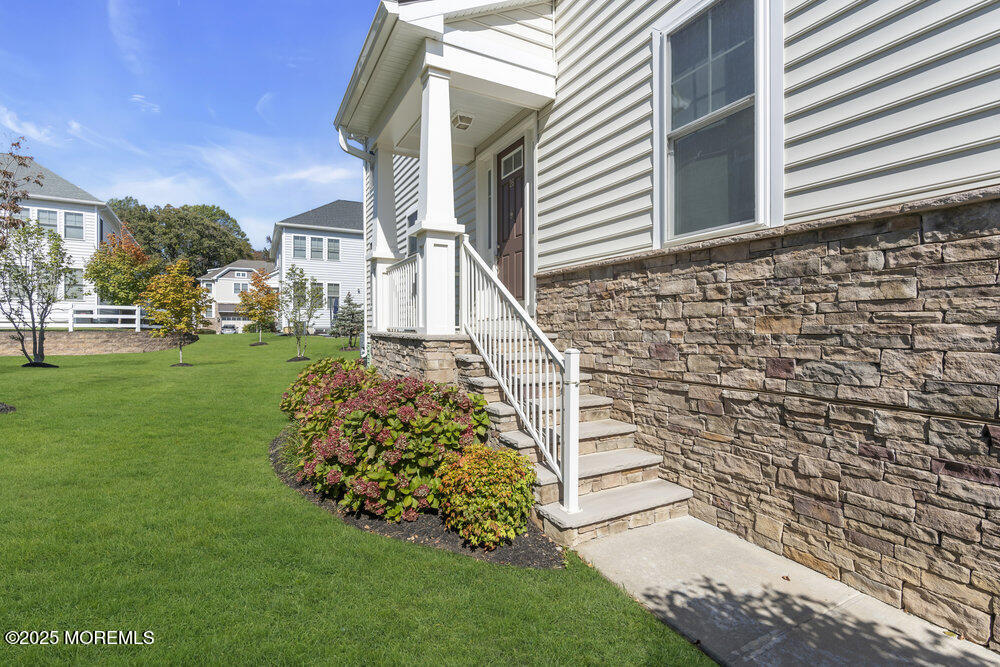 26 Malcolm Way Lincroft, NJ 07738 - Photo 5 of 44 a view of a back yard of the house