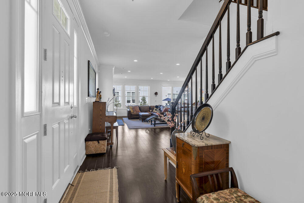 26 Malcolm Way Lincroft, NJ 07738 - Photo 7 of 44 a view of living room and dining room
