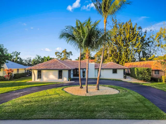 $925,000 | 220 Walton-Heath Drive, Atlantis, FL 33462