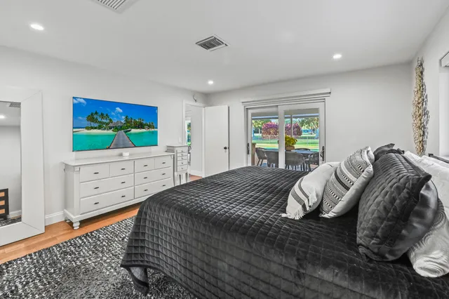 $925,000 | 220 Walton-Heath Drive, Atlantis, FL 33462