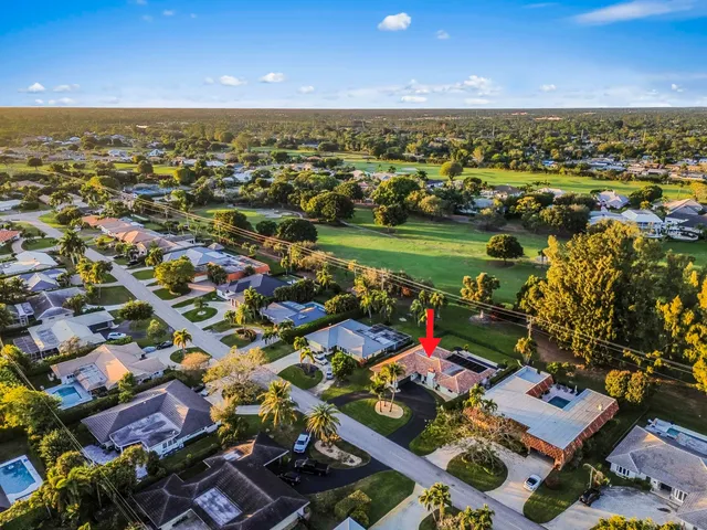 $925,000 | 220 Walton-Heath Drive, Atlantis, FL 33462