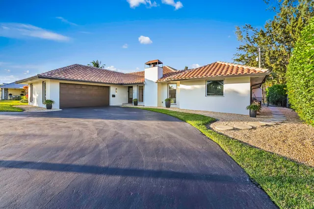 $925,000 | 220 Walton-Heath Drive, Atlantis, FL 33462