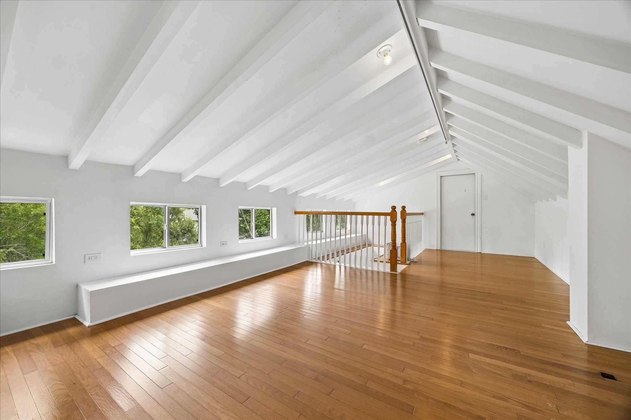3231 North MacGregor Way Houston, TX 77004 - Photo 17 of 22 Finished loft space featuring a cozy built-in window seat