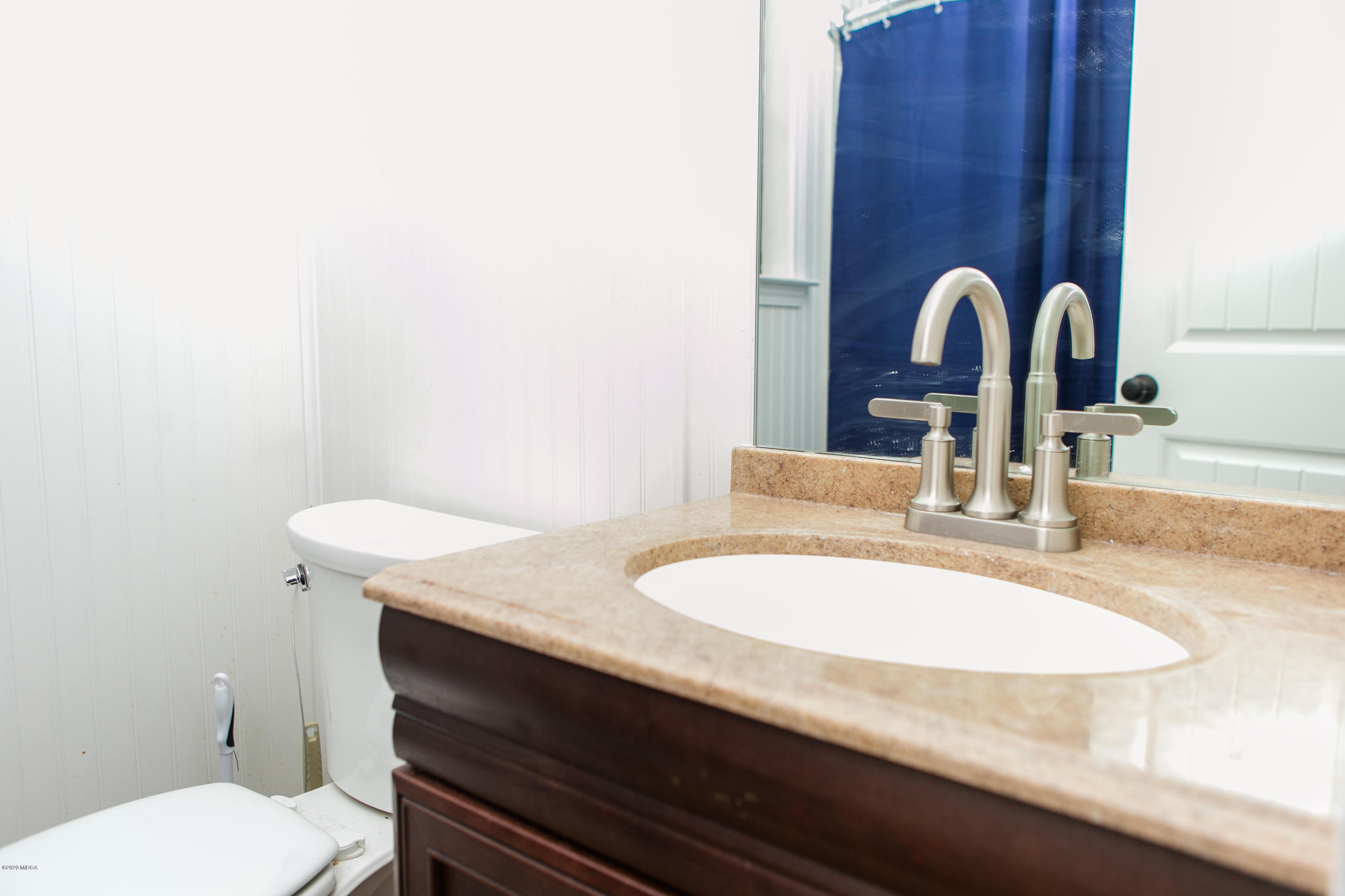 321 Plentitude Church Road Gray, GA 31032 - Photo 14 of 17 a bathroom with a sink and a toilet