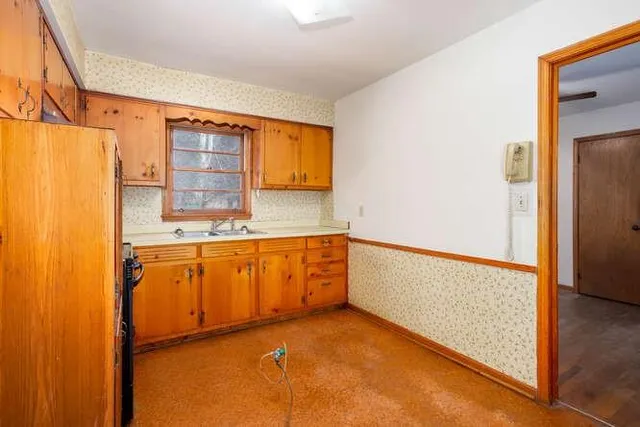 a view of walk in closet with window