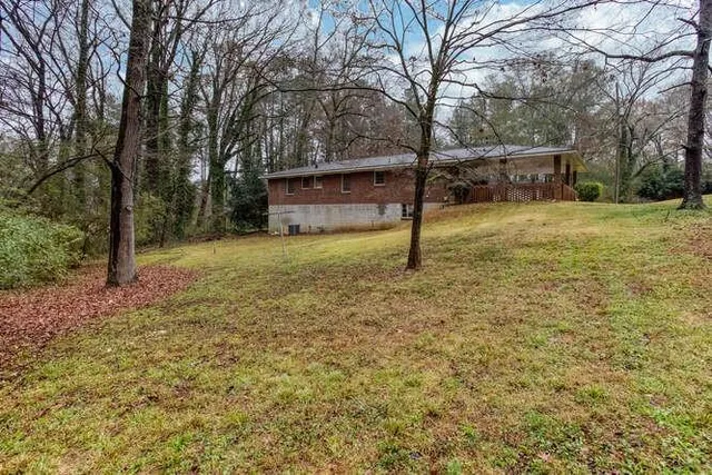 a view of a patio with a yard