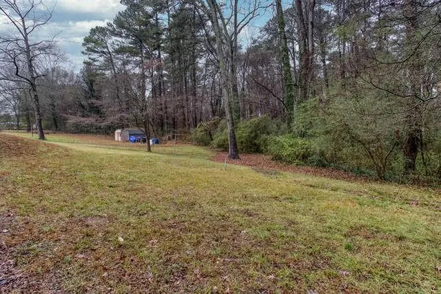 a view of a house with a swimming pool