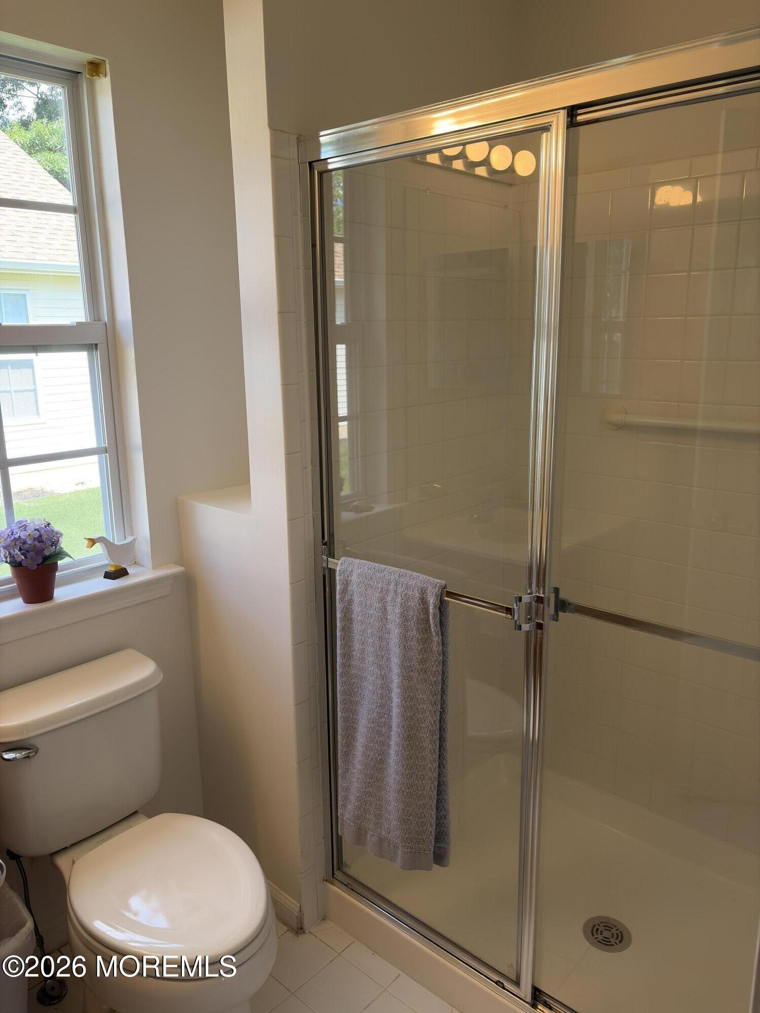 35 Meadows Lane Whiting, NJ 08759 - Photo 15 of 23 a bathroom with a toilet and a shower