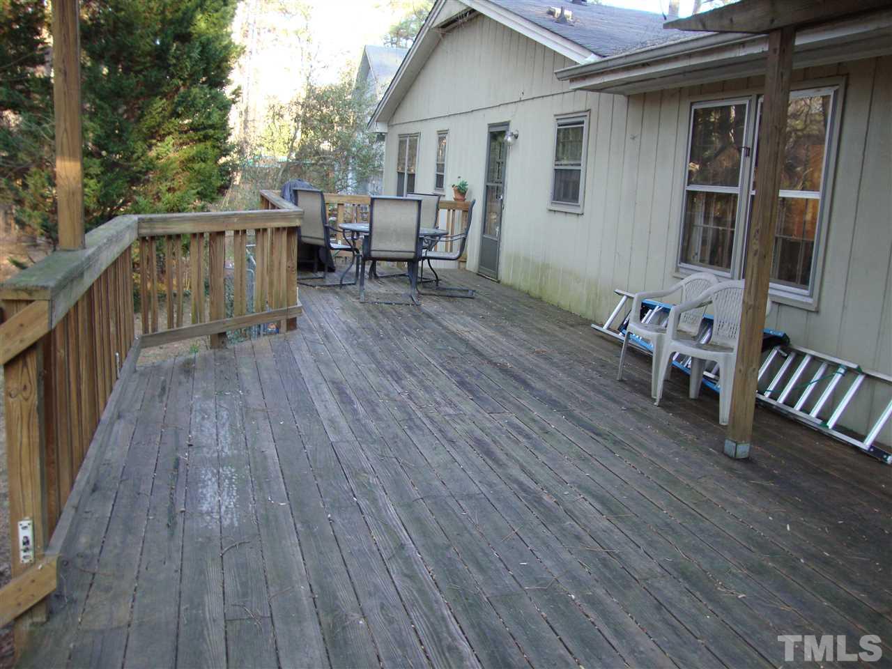 6901 Brecken Ridge Avenue Raleigh, NC 27615 - Photo 15 of 17 As you can see, this side of the deck is convenient to kitchen for grilling, and eating.