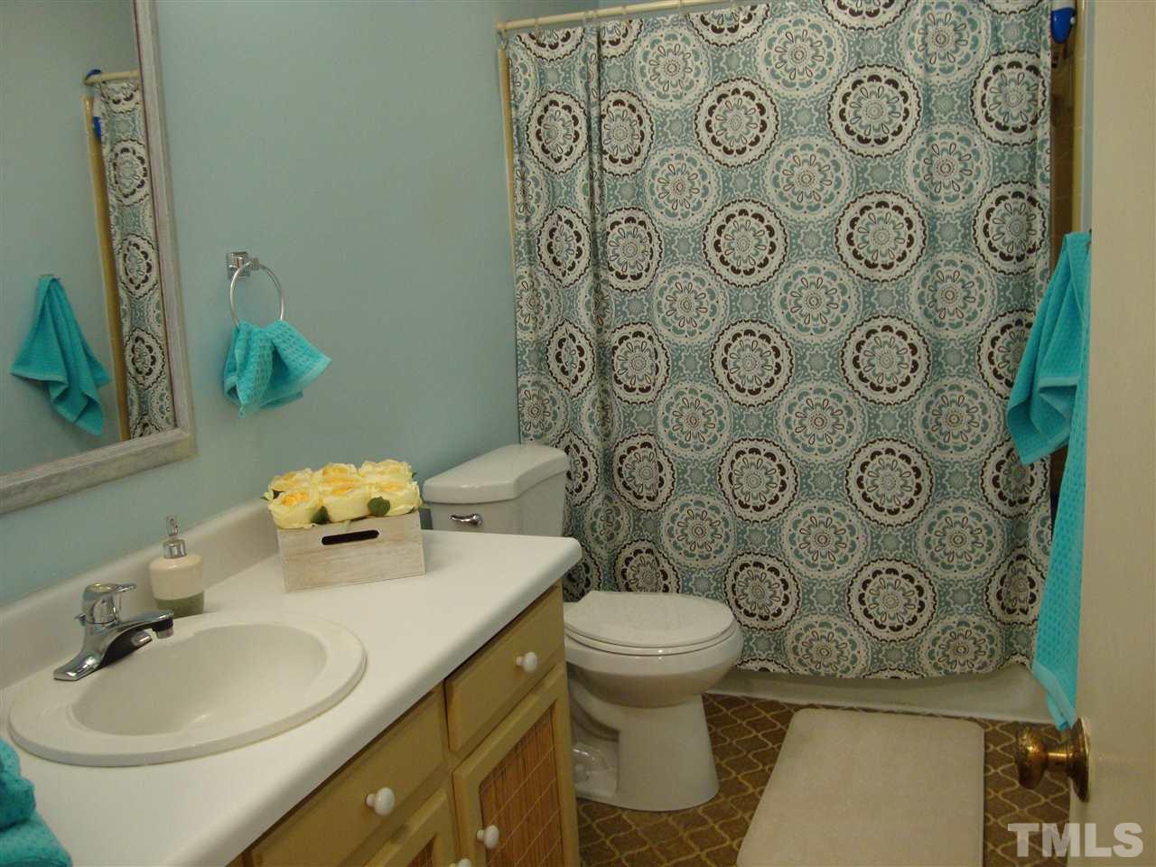 6901 Brecken Ridge Avenue Raleigh, NC 27615 - Photo 10 of 17 Nice size hall bath. Very bright and cheery.