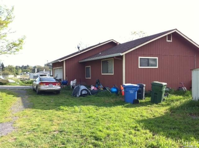 3790 Mt Vernon Road Sebastopol, CA 95472 - Photo 1 of 1 a front view of a house with garden