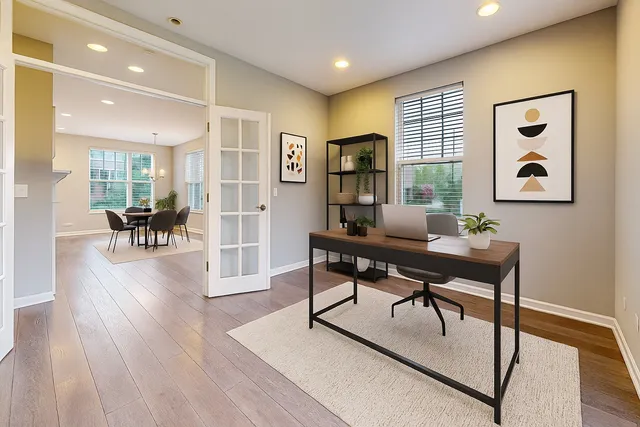 a workspace with furniture and wooden floor