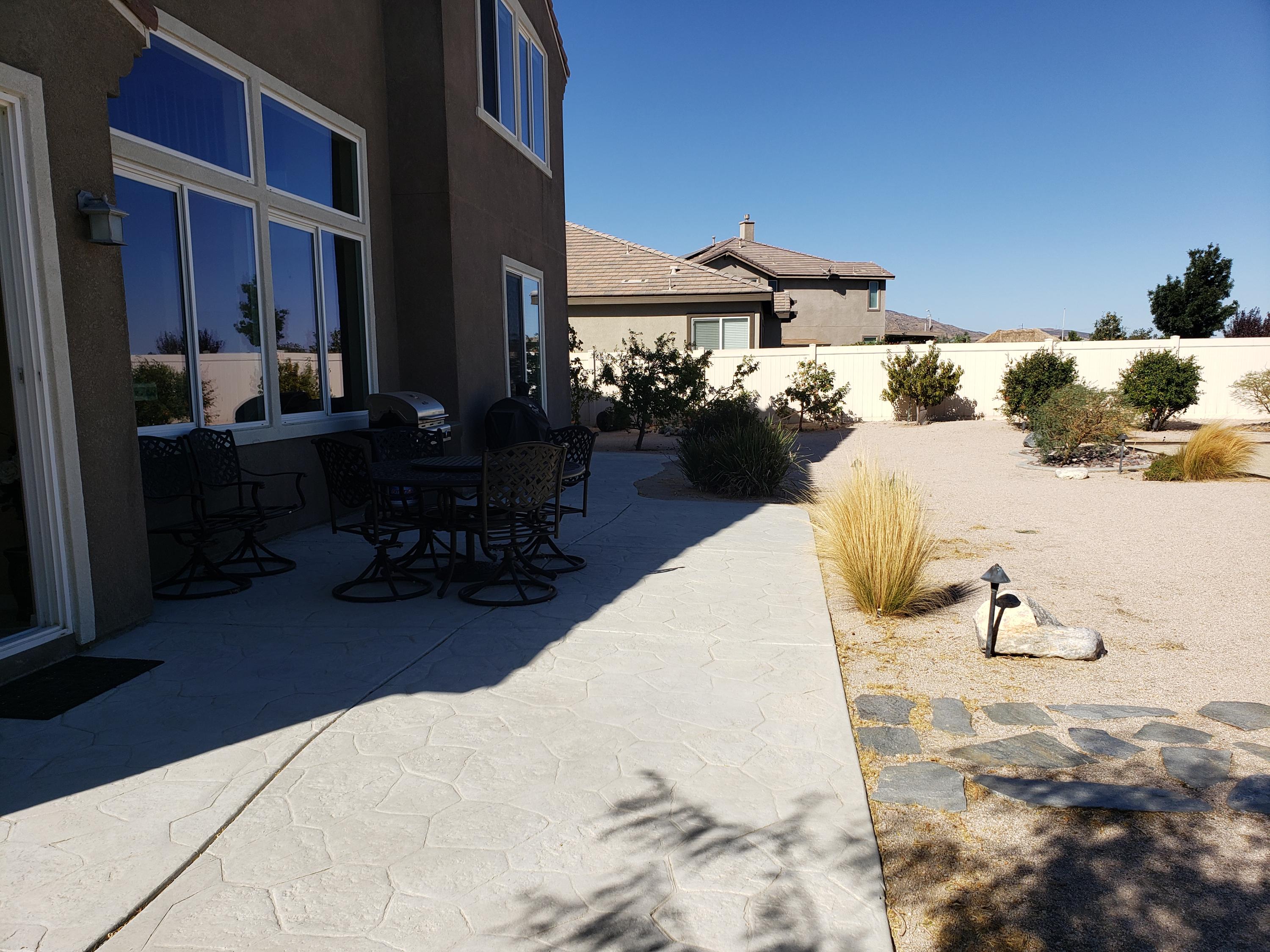 6839 Cabernet Road Palmdale, CA 93551 - Photo 3 of 21 a bed room with furniture and a large window