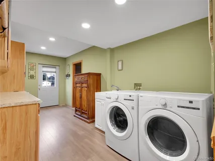 a view of room with window and wooden floor
