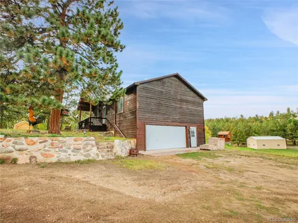 a view of a yard with a slide