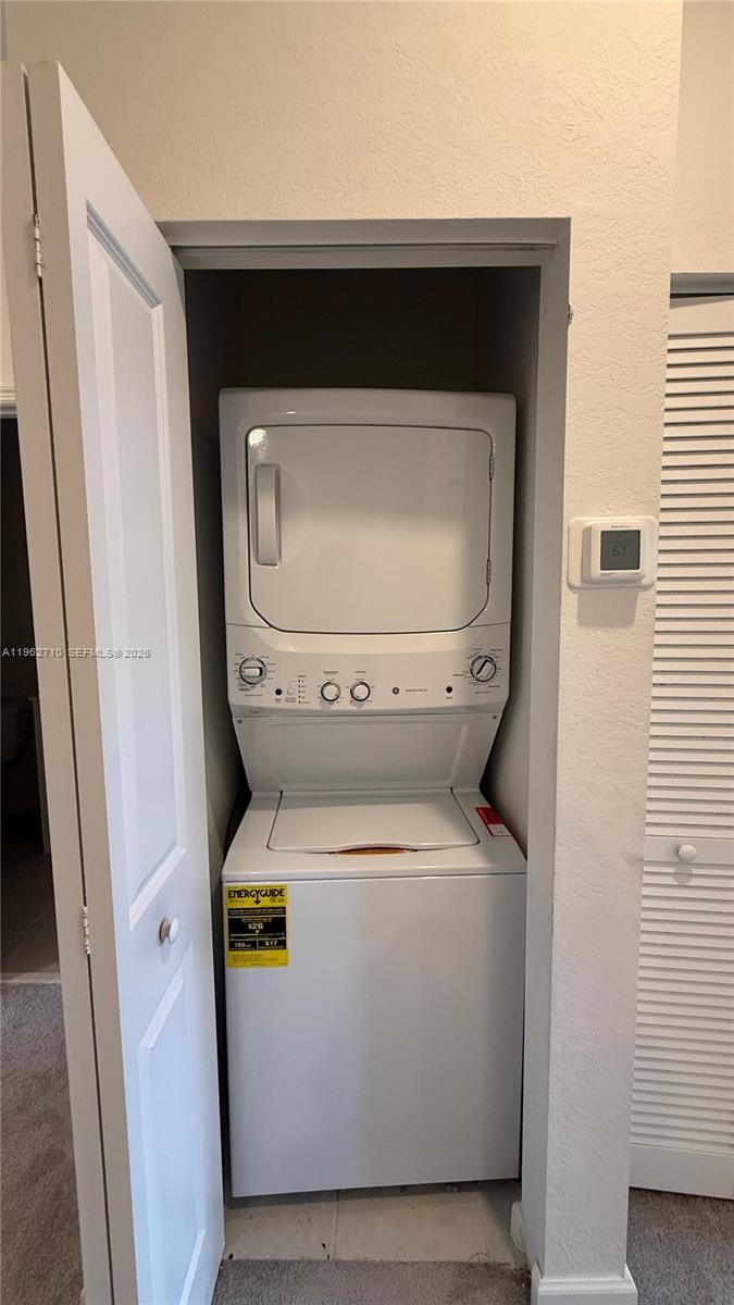 16244 Southwest 291st Street, Unit 16244 Homestead, FL 33033 - Photo 25 of 49 a close up view of washer and dryer