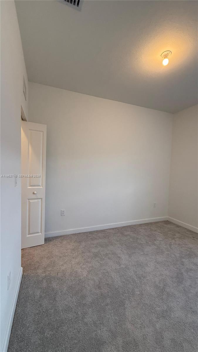16244 Southwest 291st Street, Unit 16244 Homestead, FL 33033 - Photo 30 of 49 a view of empty room
