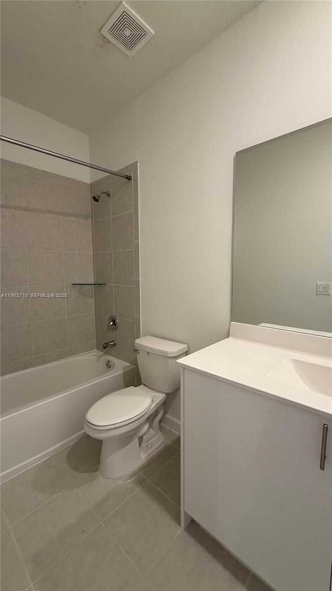 16244 Southwest 291st Street, Unit 16244 Homestead, FL 33033 - Photo 32 of 49 a bathroom with a sink a toilet and shower