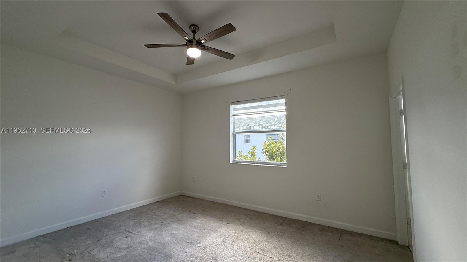 16244 Southwest 291st Street, Unit 16244 Homestead, FL 33033 - Photo 41 of 49 an empty room with a window