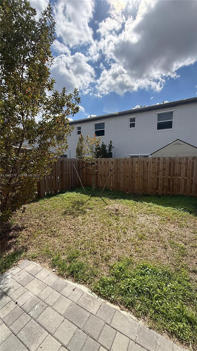 16244 Southwest 291st Street, Unit 16244 Homestead, FL 33033 - Photo 49 of 49 a backyard of a house