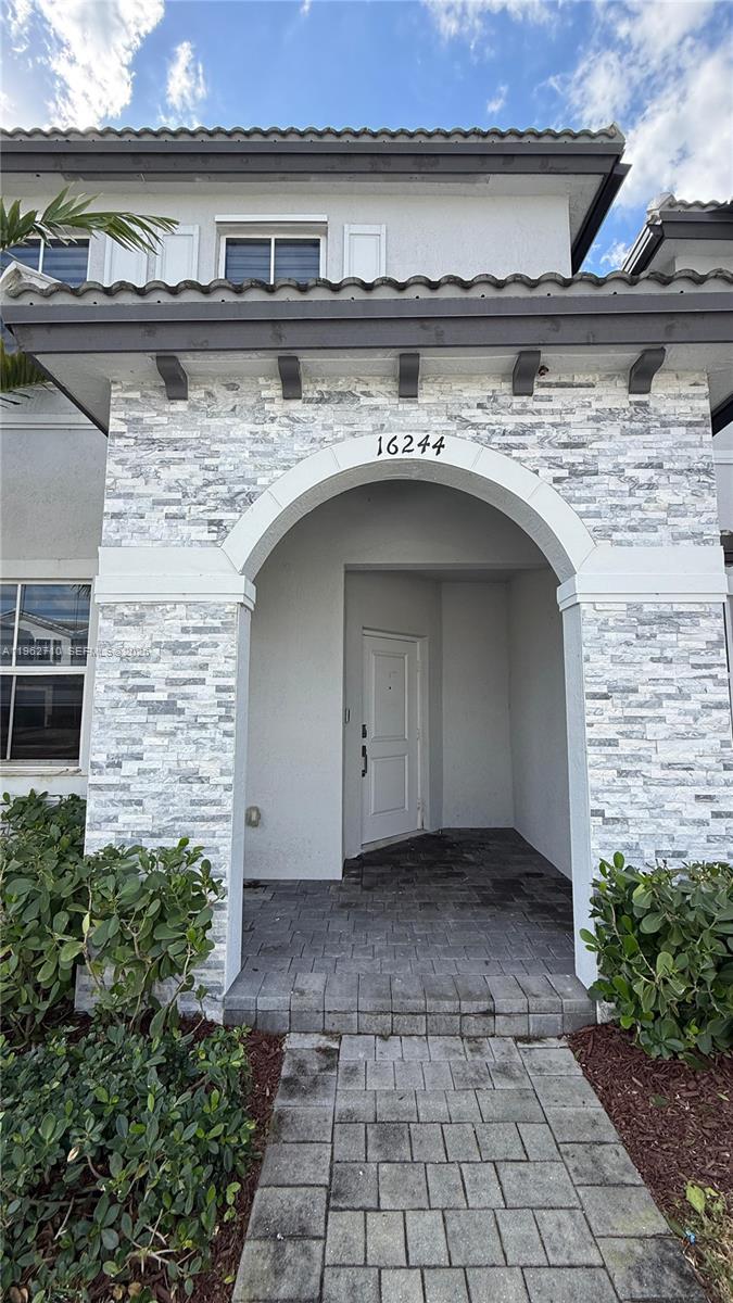 16244 Southwest 291st Street, Unit 16244 Homestead, FL 33033 - Photo 5 of 49 a view of a building