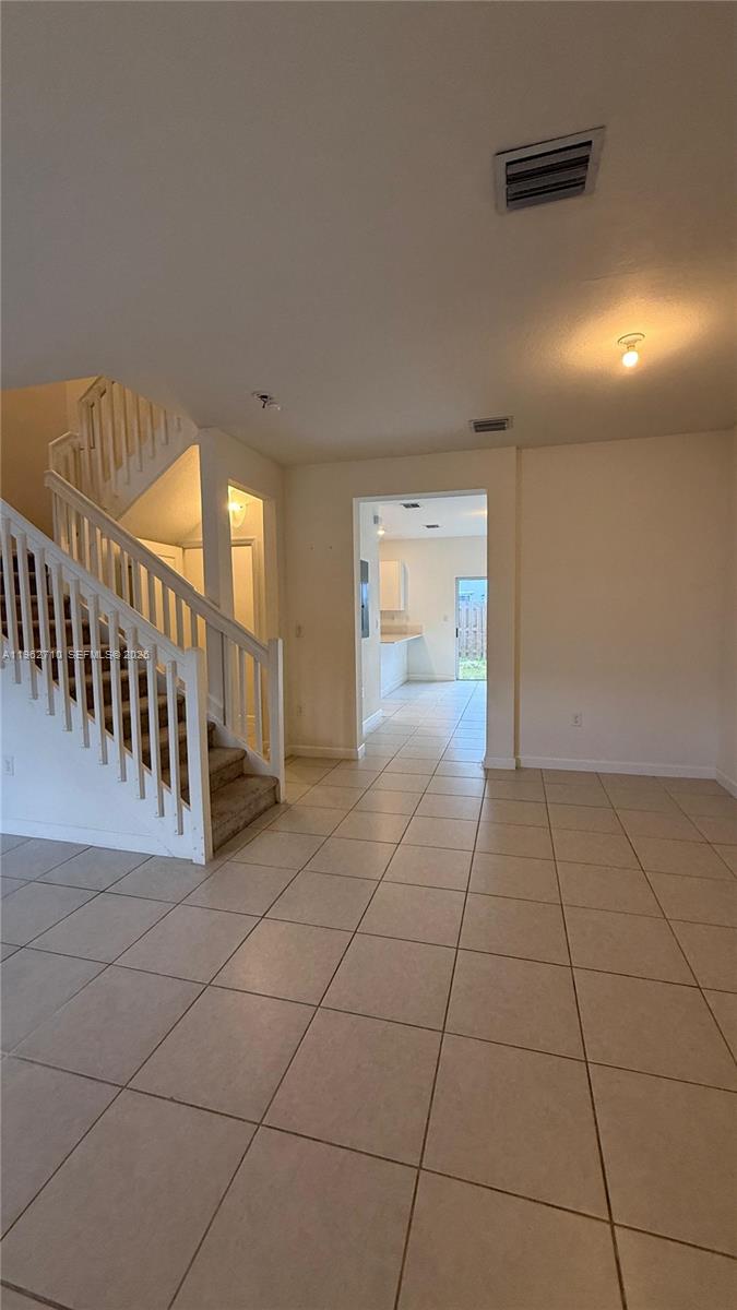 16244 Southwest 291st Street, Unit 16244 Homestead, FL 33033 - Photo 8 of 49 a view of an entryway with a hallway
