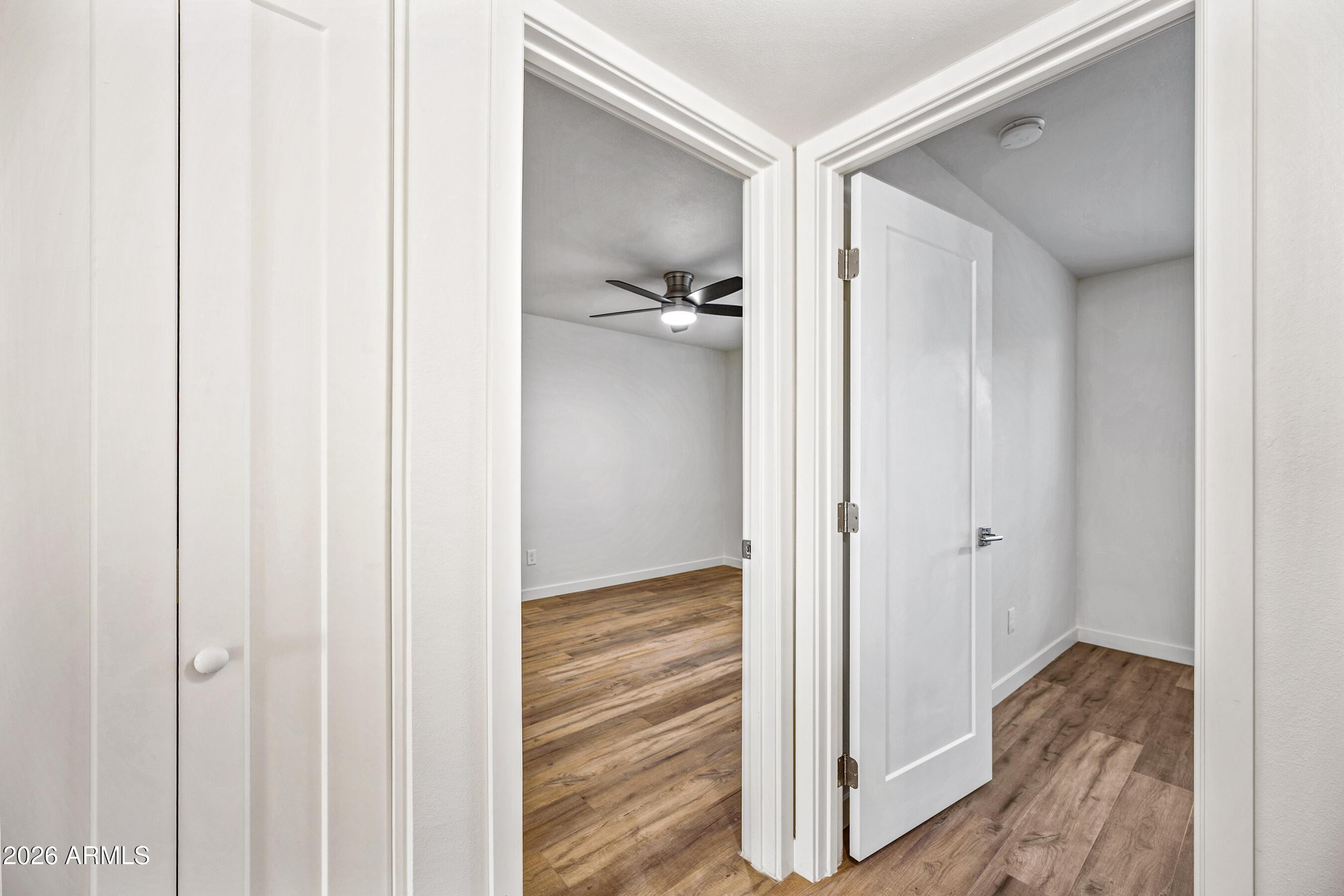4139 North 27th Street, Unit 4 Phoenix, AZ 85016 - Photo 15 of 29 a view of a hallway with closet and wooden floor