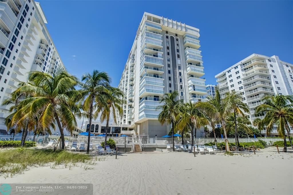 1000 South Ocean Boulevard, Unit 5O Pompano Beach, FL 33062 - Photo 2 of 42 front view of a tall building next to a yard